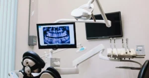 Panoramic dental x-ray displayed on a monitor in a high-tech naples, fl dental clinic equipped with advanced diagnostic and treatment tools.