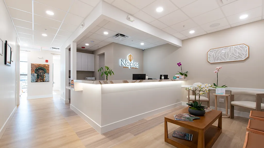 Modern dental office reception area at naples dental boutique